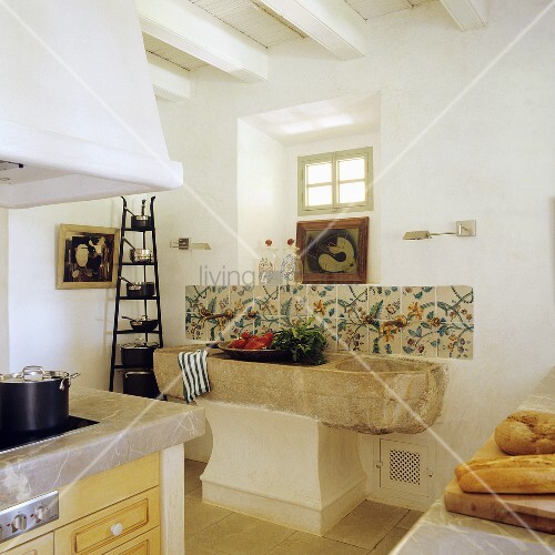 A Rustic Stone Sink In The Kitchen Of A Buy Image