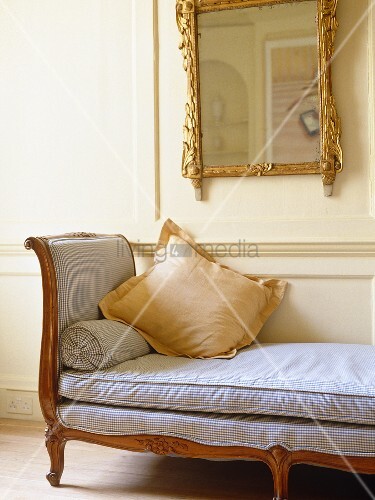 Backless Sofa Under Gilt Mirror In Image 00709471 Backless Sofa Under Gilt Mirror In